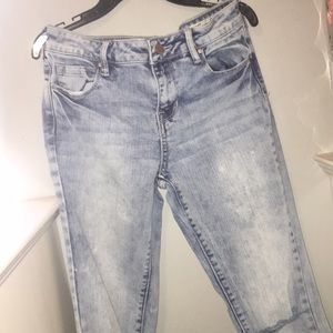 Distressed acid washed jeans